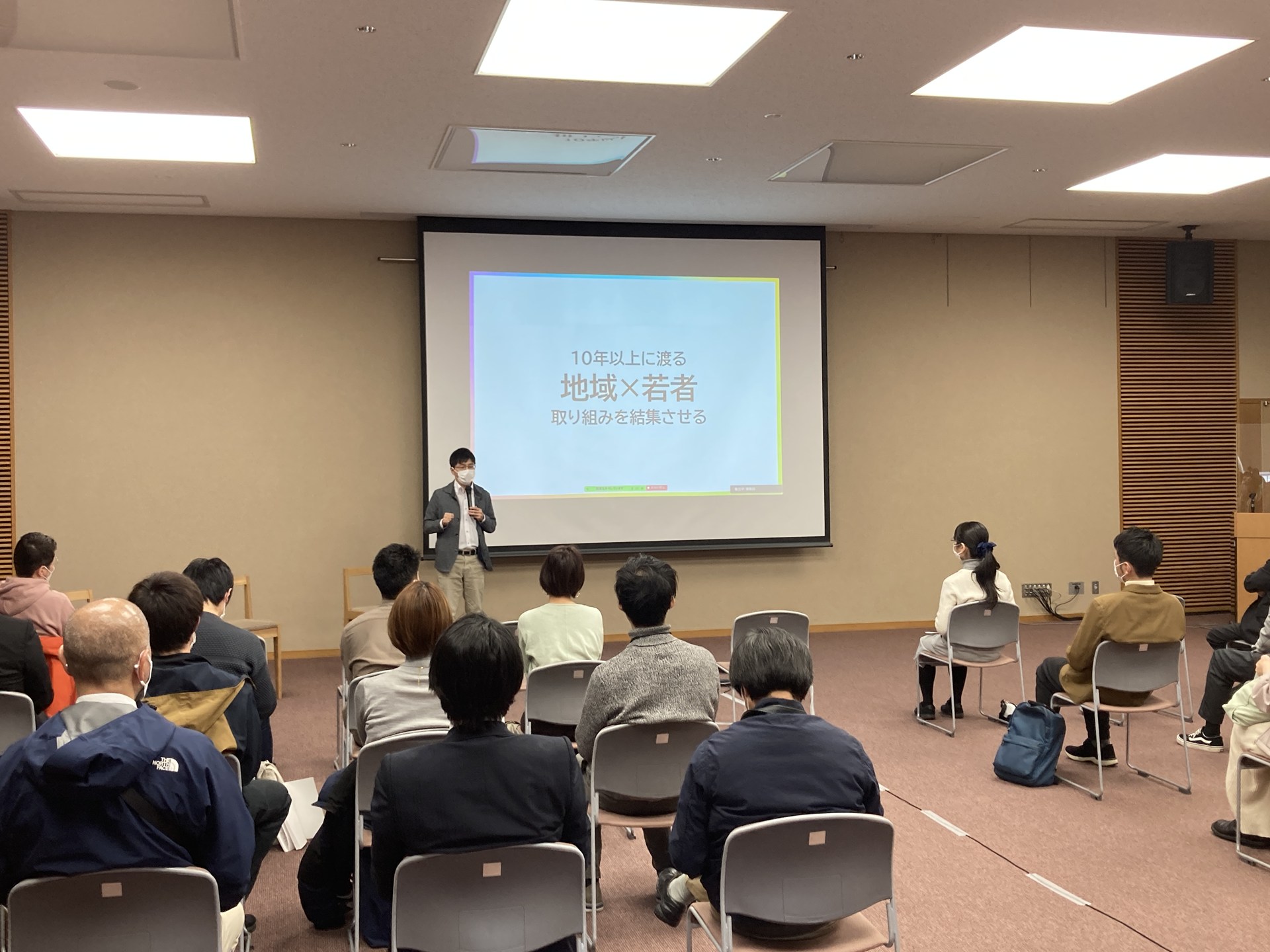 CoIUのイベントでプレゼンする南田さん